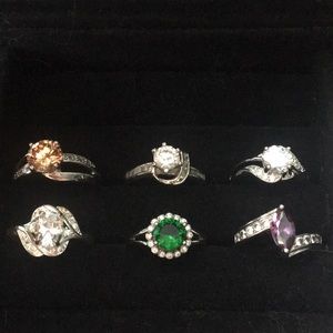 6 multicolored silver rings